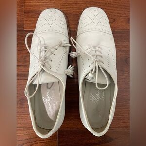 Joan Helpern- Hand made in Italy white leather cap toe shoes with tassels.Size 9